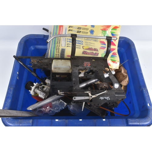 174 - SIX TRAYS CONTAINING RC HELICOPTER PARTS including nose cones, tail rods, rotors, engine parts, manu...