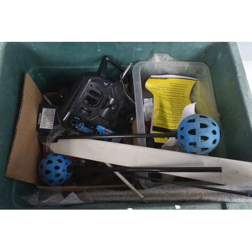 174 - SIX TRAYS CONTAINING RC HELICOPTER PARTS including nose cones, tail rods, rotors, engine parts, manu...