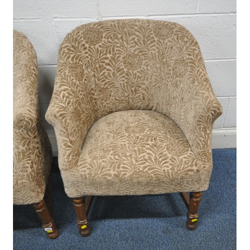 155 - A PAIR OF EARLY 2OTH CENTURY TUB CHAIRS, with foliate upholstery, raised on oak legs, width 67cm x d... 