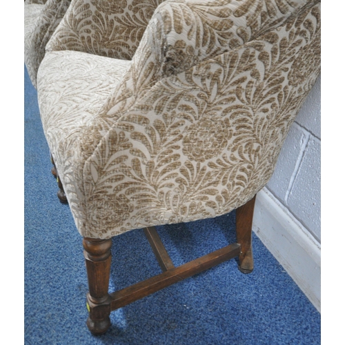 155 - A PAIR OF EARLY 2OTH CENTURY TUB CHAIRS, with foliate upholstery, raised on oak legs, width 67cm x d... 