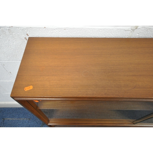 161 - POSSIBLE ROBERT HERIATGE FOR BEAVER AND TAPLEY, A MID-CENTURY TEAK BOOKCASE, with double glass slidi... 