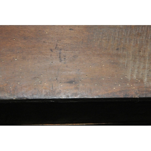 163 - A GEORGIAN OAK DRESSER, the plate rack fitted with an arrangement of shelving, and two cupboard door... 