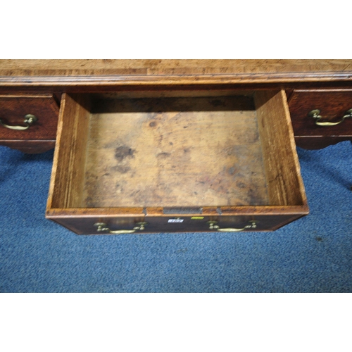163 - A GEORGIAN OAK DRESSER, the plate rack fitted with an arrangement of shelving, and two cupboard door... 