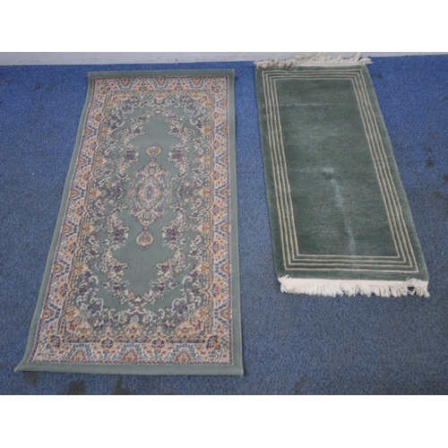 164 - A GREEN GROUND SAMARKAND RECTANGULAR RUG, with repeating foliate patterns, and a multi-strap border,... 