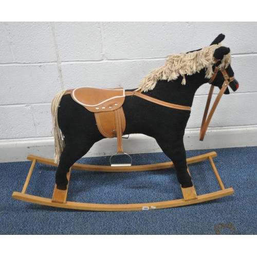 165 - A BLACK UPHOLSTERED ROCKING HORSE, height 81cm, condition report: overall good condition