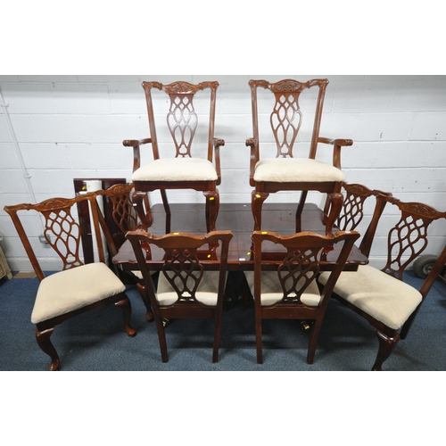 166 - A REPRODUCTION MAHOGANY TWIN PEDESTAL DINING TABLE, with one additional leaf, each leg with brass ca... 