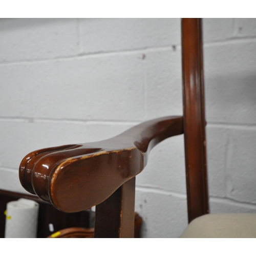 166 - A REPRODUCTION MAHOGANY TWIN PEDESTAL DINING TABLE, with one additional leaf, each leg with brass ca... 