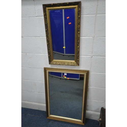 170 - TWO GILT WOOD RECTANGULAR WALL MIRRORS, largest 89cm x 63cm, along with a travelling trunk, conditio... 