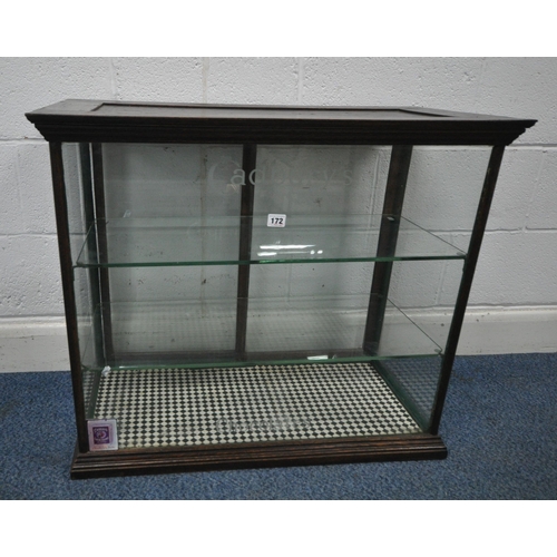 172 - A CADBURY'S CHOCOLATE COUNTER TOP DISPLAY CABINET, with rear double sliding glass doors, that are en... 