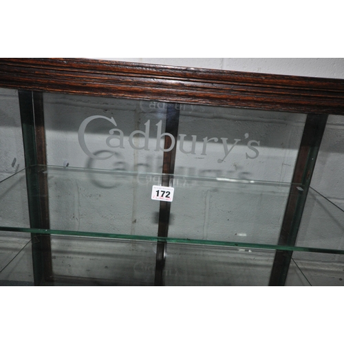 172 - A CADBURY'S CHOCOLATE COUNTER TOP DISPLAY CABINET, with rear double sliding glass doors, that are en... 
