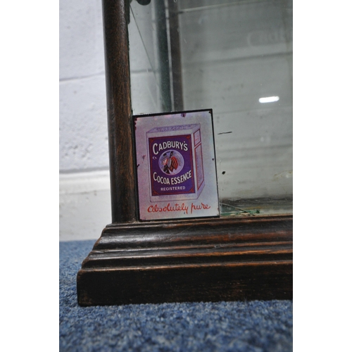 172 - A CADBURY'S CHOCOLATE COUNTER TOP DISPLAY CABINET, with rear double sliding glass doors, that are en... 