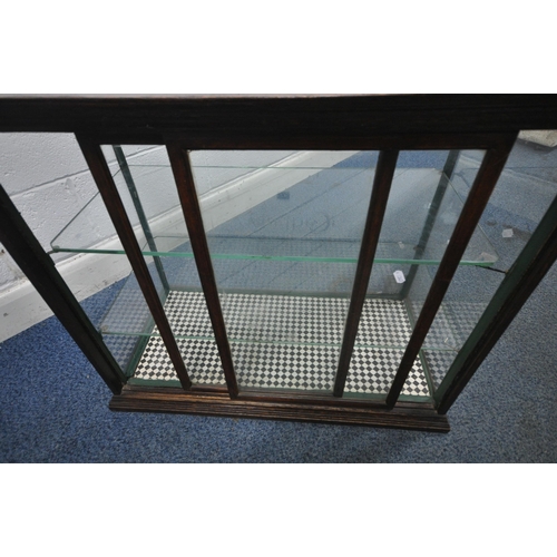 172 - A CADBURY'S CHOCOLATE COUNTER TOP DISPLAY CABINET, with rear double sliding glass doors, that are en... 