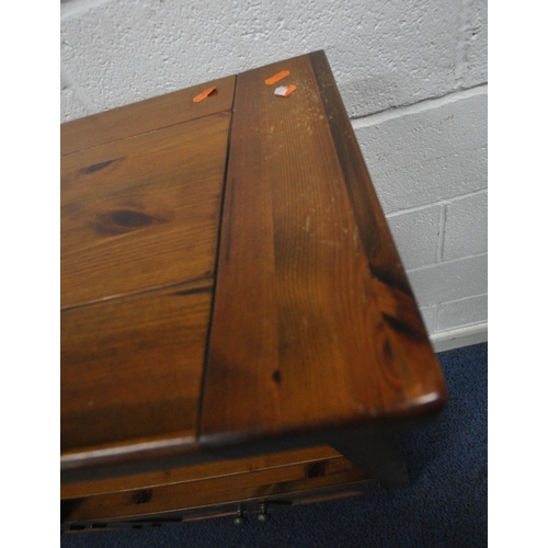 174 - A MODERN PINE BOOKCASE, fitted with four cupboard doors, width 150cm x depth 30cm x height 120cm, co... 