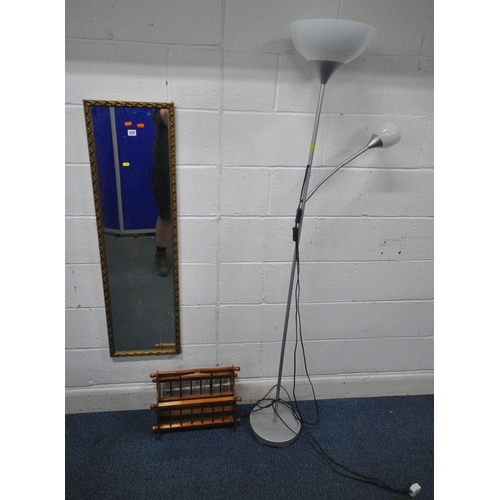 177 - A RECTANGULAR GILT WOOD WALL MIRROR, 120cm x 35cm, a standard lamp, along with a magazine rack, cond... 
