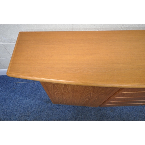 178 - SKOVBY, A MID-CENTURY TEAK SIDEBOARD, with overhanding ends, fitted with five drawers, flanked by tw... 