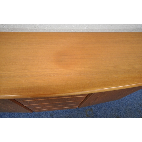 178 - SKOVBY, A MID-CENTURY TEAK SIDEBOARD, with overhanding ends, fitted with five drawers, flanked by tw... 