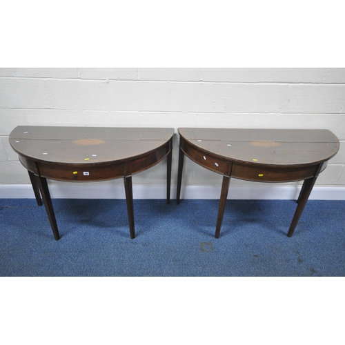 180 - A PAIR OF GEORGIAN MAHOGANY D-END TABLES, each with central shell inlay, raised on square tapered le... 