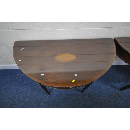 180 - A PAIR OF GEORGIAN MAHOGANY D-END TABLES, each with central shell inlay, raised on square tapered le... 