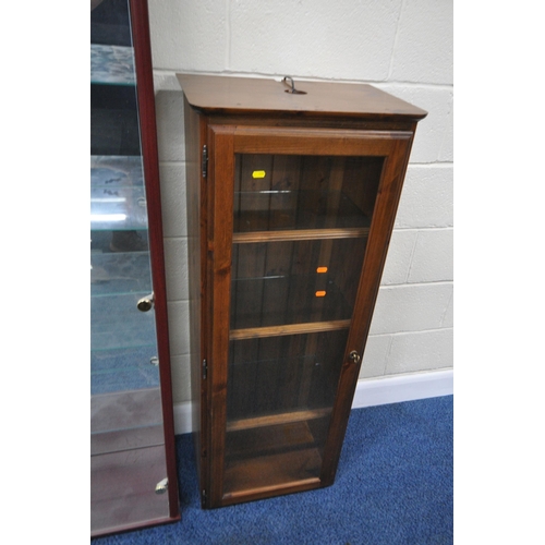 190 - A MODERN DISPLAY CABINET, the double glass doors enclosing a mirrored back, and four glass shelves, ... 
