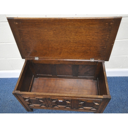 192 - A 20TH CENTURY OAK BLANKET CHEST, with three geometric panels to the front, width 91cm x depth 45cm ... 