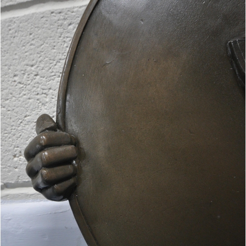 193 - ANDRE WALLACE, A BRONZE EFFECT 'THE JOKER' WALL HANGING WATER FOUNTAIN, disk diameter 49cm x width 5... 
