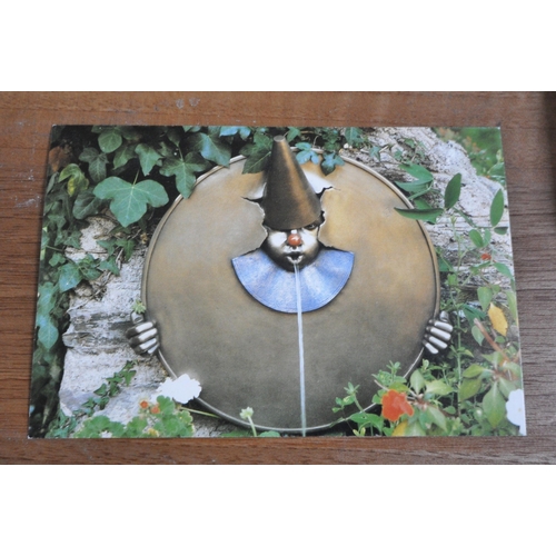 193 - ANDRE WALLACE, A BRONZE EFFECT 'THE JOKER' WALL HANGING WATER FOUNTAIN, disk diameter 49cm x width 5... 