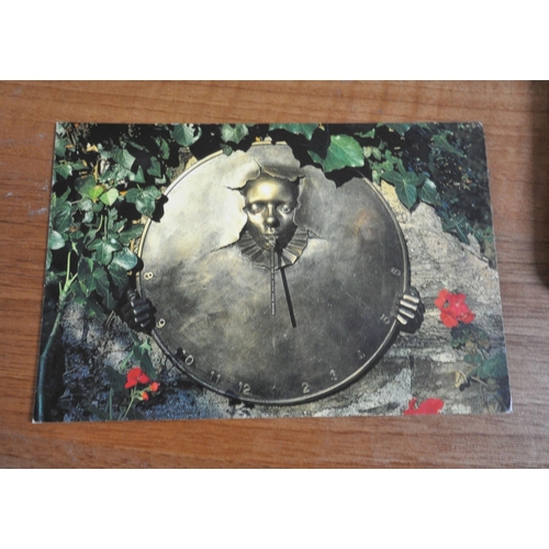 194 - ANDRE WALLACE, A BRONZE EFFECT 'CLOWN' WALL HANGING SUN DIAL, disk diameter 49cm x width 54cm x dept... 