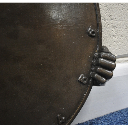 194 - ANDRE WALLACE, A BRONZE EFFECT 'CLOWN' WALL HANGING SUN DIAL, disk diameter 49cm x width 54cm x dept... 
