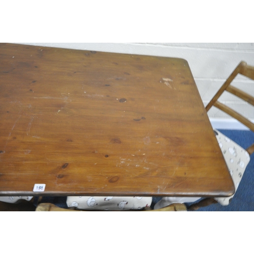 196 - A PARTIALLY PAINTED PINE RECTANGULAR FARMHOUSE STYLE TABLE, raised on turned legs, length 132cm x de... 