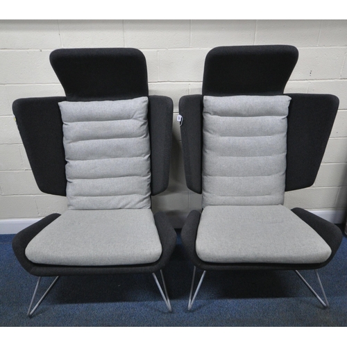 197 - ORANGEBOX ADEN  HBH-01, A PAIR OF LARGE GREY AND CHARCOAL UPHOLSTERED WING BACK ARMCHAIRS, with a ho... 