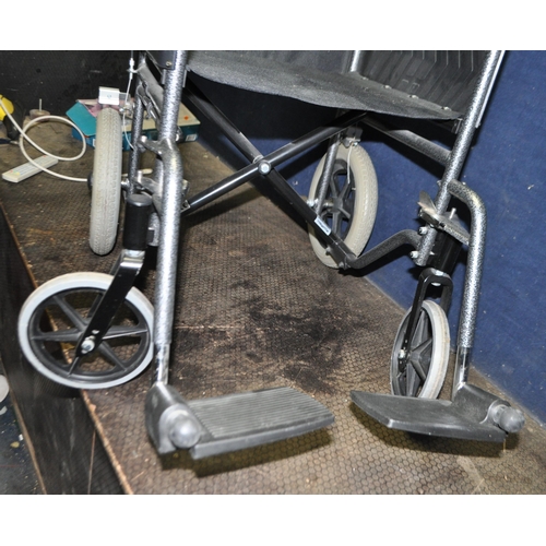 83 - A ROMA MEDICAL FOLDING WHEELCHAIR, with two footrests
