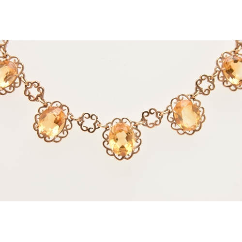 430 - A 9CT GOLD CITRINE NECKLACE, set with five oval cut Citrine's each in a four claw setting within an ... 