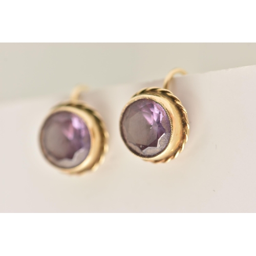 432 - A PAIR OF YELLOW METAL GEM SET EARRINGS, for non-pierced ears, circular cut light purple stones asse... 