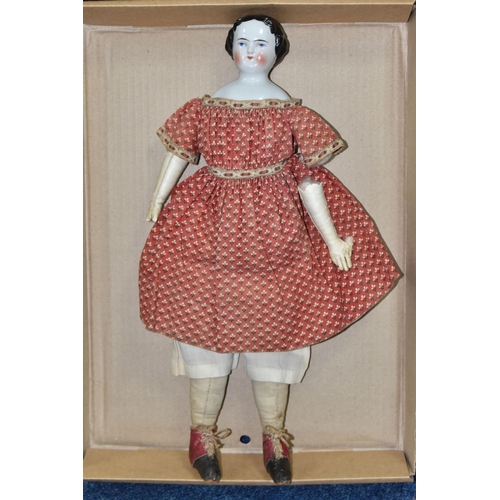 1020 - A NINETEENTH CENTURY PORCELAIN HEAD DOLL, with hand stitched cloth body and legs, kid leather arms a...