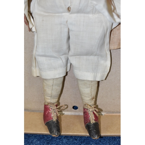 1020 - A NINETEENTH CENTURY PORCELAIN HEAD DOLL, with hand stitched cloth body and legs, kid leather arms a...