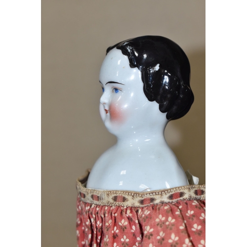 1020 - A NINETEENTH CENTURY PORCELAIN HEAD DOLL, with hand stitched cloth body and legs, kid leather arms a...