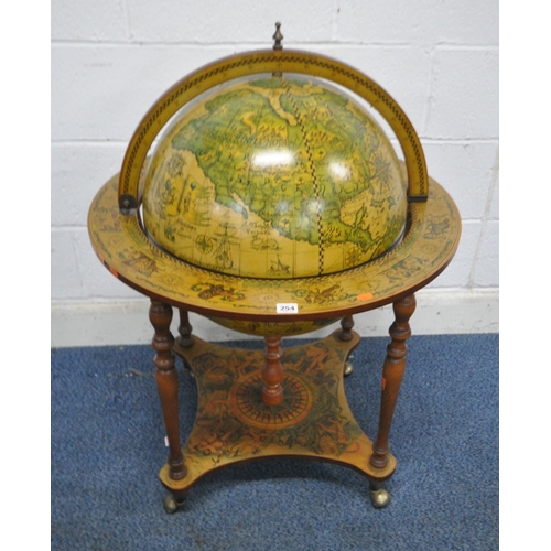 141 - STANLEY WOOD OF OLNEY, BUCKINGHAMSHIRE, A 20TH CENTURY OAK DRAW LEAF DINING TABLE, raised on bulbous...