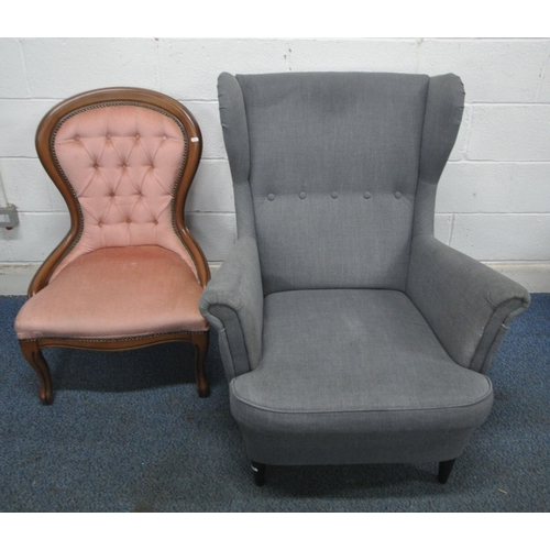 146 - A GREY UPHOLSTERED WINGBACK ARMCHAIR, width 82cm x depth 100cm x height 100cm, along with a reproduc... 