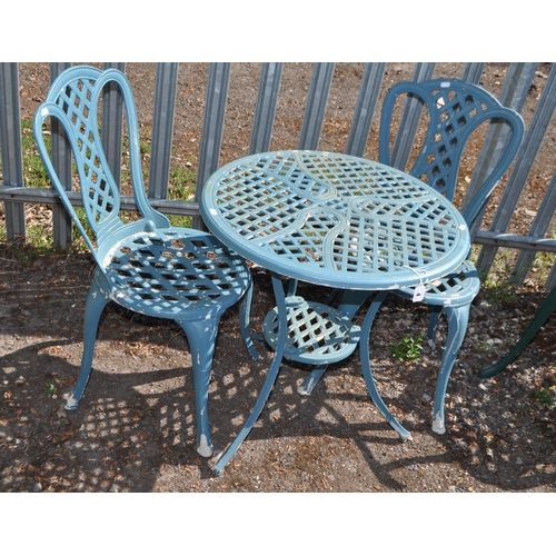 4 - A CAST ALUMINIUM GARDEN TABLE AND TWO MATCHING CHAIRS table diameter 61cm, Condition report: paint l... 