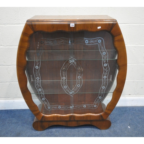 156 - AN ART DECO WALNUT CHINA CABINET, the double glass sliding doors with foliate patterns, that are enc... 