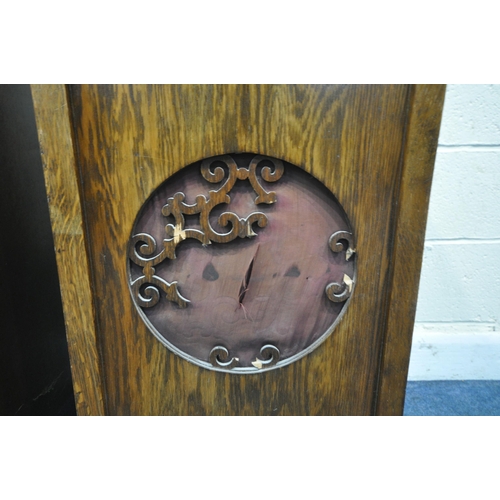 170 - AN EARLY 20TH CENTURY OAK MEDIA CABINET, with a hinged lid, a distressed fretwork front, and a singl... 