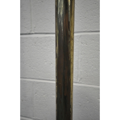 172 - A BRASS TELESCOPIC STANDARD LAMP, on a circular stepped base, with three paw feet, maximum height 16... 