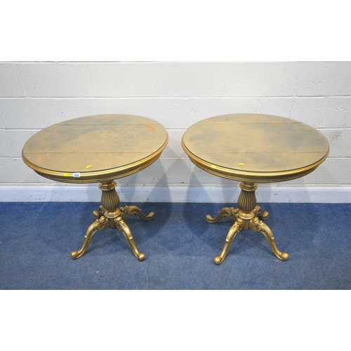 205 - A PAIR OF GILT CIRCULAR SINGLE PEDESTAL TABLES, with a bulbous support, raised on four scrolled and ... 