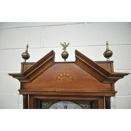 213 - A GEORGIAN OAK EIGHT DAY LONGCASE CLOCK, the hood with a broken arch pediment, three brass finials, ... 