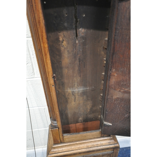 213 - A GEORGIAN OAK EIGHT DAY LONGCASE CLOCK, the hood with a broken arch pediment, three brass finials, ... 