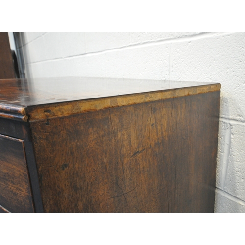 220 - A GEORGIAN MAHOGANY BOW FRONT CHEST OF TWO SHORT OVER THREE GRADUATED DRAWERS, raised on bracket fee... 