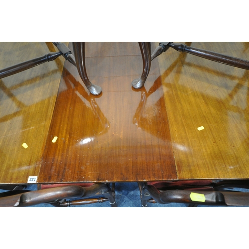 224 - AN EDWARDIAN MAHOGANY WIND OUT DINING TABLE, with two additional leaves, raised on square tapered le... 