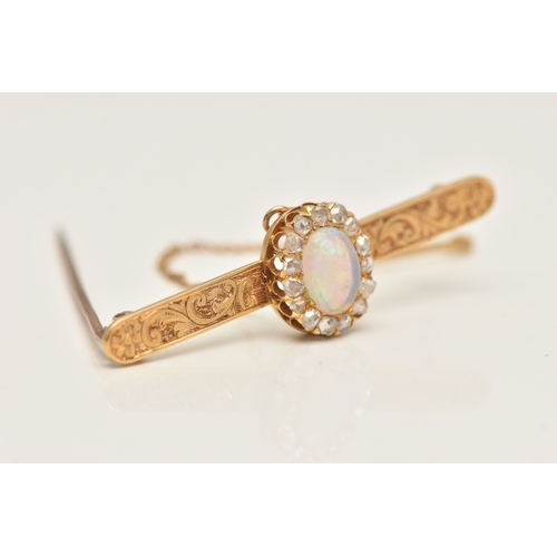 419 - A BOXED OPAL AND DIAMOND BAR BROOCH, designed as an oval cluster set with a central oval cut white o... 
