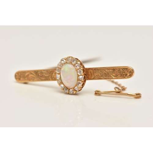 419 - A BOXED OPAL AND DIAMOND BAR BROOCH, designed as an oval cluster set with a central oval cut white o... 