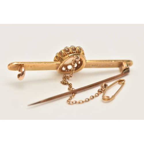 419 - A BOXED OPAL AND DIAMOND BAR BROOCH, designed as an oval cluster set with a central oval cut white o... 